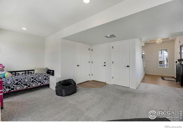 542 Highlands Cir, Erie, CO 80516 - carpeted bedroom with recessed lighting