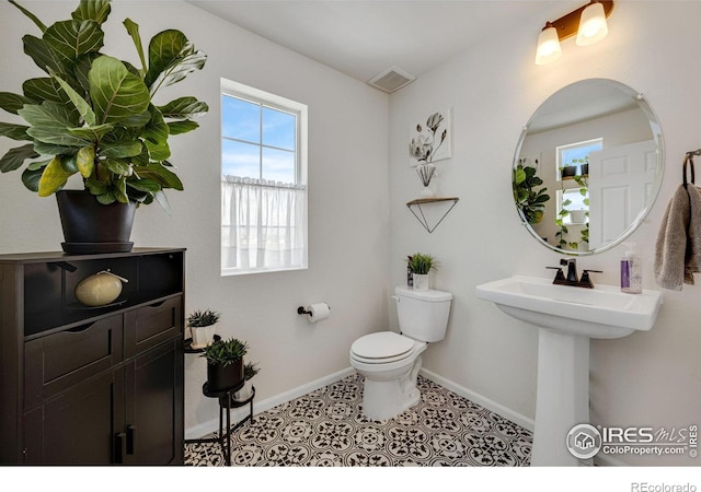 542 Highlands Cir, Erie, CO 80516 - half bath with toilet and baseboards
