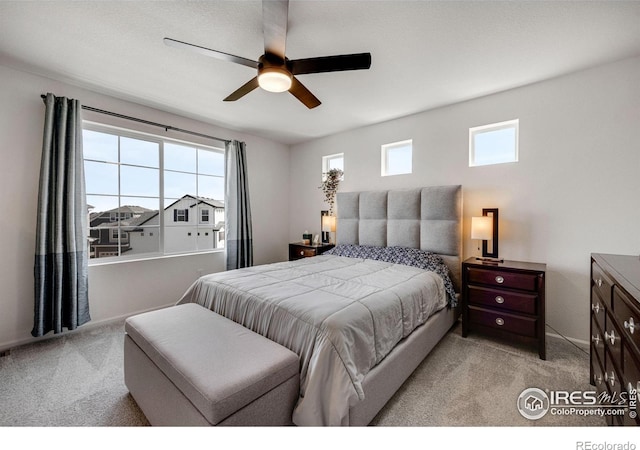 542 Highlands Cir, Erie, CO 80516 - bedroom with carpet floors and a ceiling fan