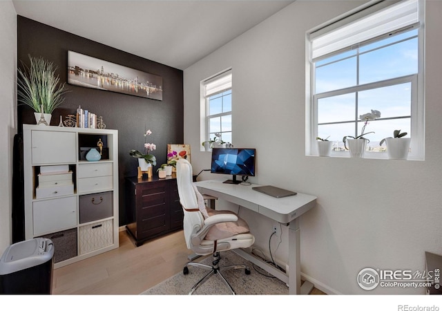 542 Highlands Cir, Erie, CO 80516 - office area with light wood-type flooring and baseboards