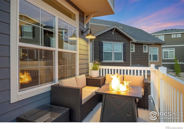 542 Highlands Cir, Erie, CO 80516 - balcony with an outdoor living space with a fire pit