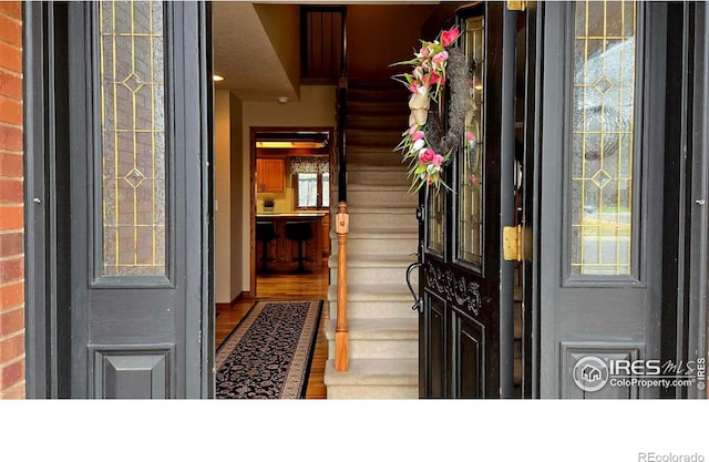 2152 45th Ave, Greeley, CO 80634 - foyer entrance featuring wood finished floors