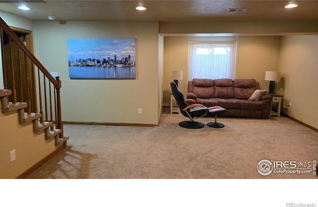 2152 45th Ave, Greeley, CO 80634 - carpeted living area with stairway, recessed lighting, and baseboards