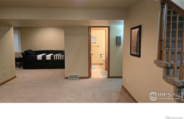 2152 45th Ave, Greeley, CO 80634 - carpeted bedroom with baseboards and connected bathroom