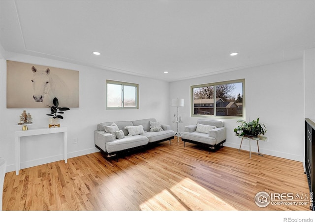 4642 Everett Ct, Wheat Ridge, CO 80033 - living area with plenty of natural light, light wood-style flooring, recessed lighting, and baseboards