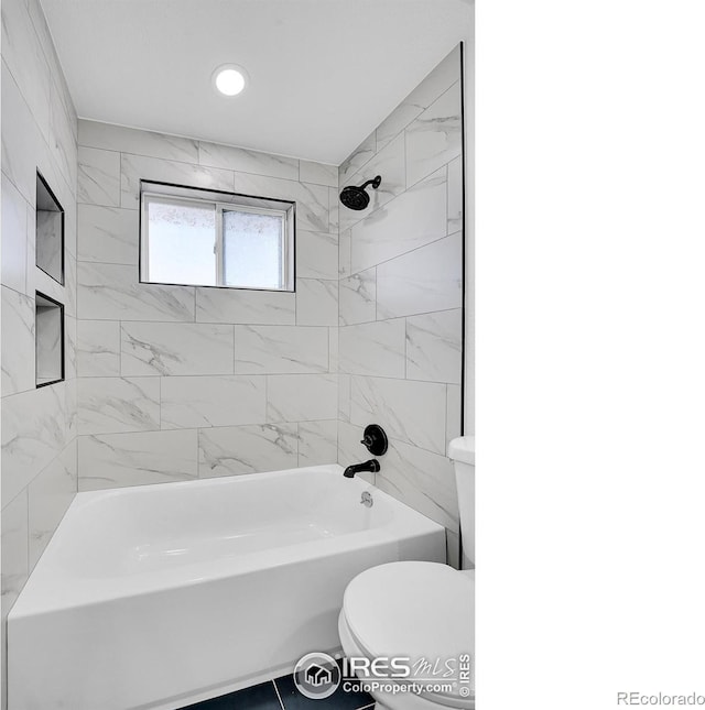 4642 Everett Ct, Wheat Ridge, CO 80033 - full bathroom featuring toilet and bathing tub / shower combination
