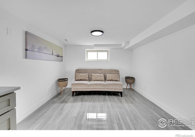 4642 Everett Ct, Wheat Ridge, CO 80033 - sitting room with baseboards and wood finished floors