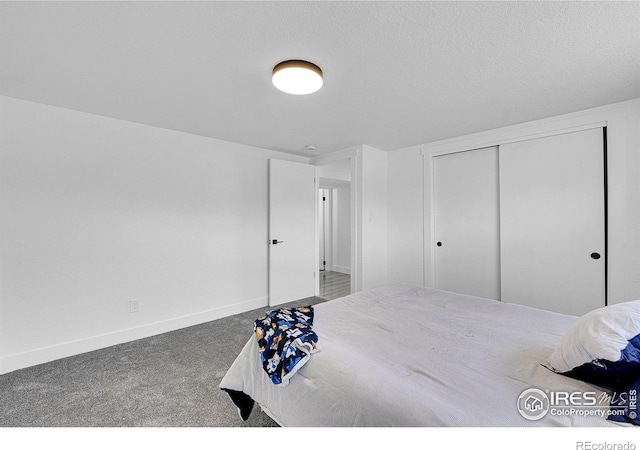 4642 Everett Ct, Wheat Ridge, CO 80033 - carpeted bedroom with baseboards and a closet