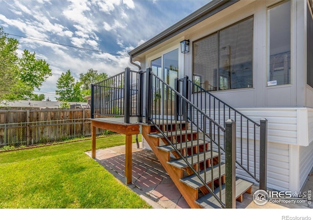 4642 Everett Ct, Wheat Ridge, CO 80033 - wooden deck featuring a patio