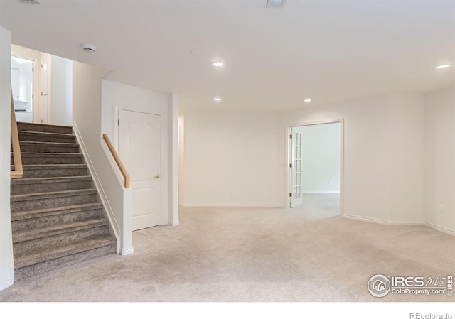 4326 Clay Commons Ct, Boulder, CO 80303 - basement featuring carpet, stairs, recessed lighting, and baseboards