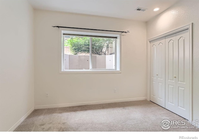 4326 Clay Commons Ct, Boulder, CO 80303 - unfurnished bedroom with light colored carpet, a closet, and baseboards