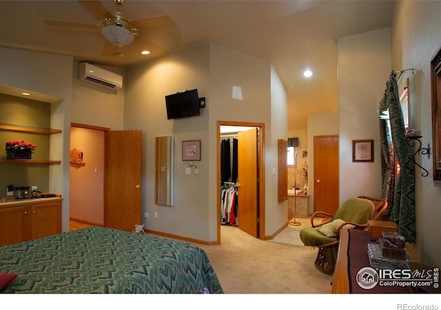 1314 State Highway 66, Longmont, CO 80504 - bedroom with a wall mounted AC, high vaulted ceiling, a spacious closet, light carpet, and ensuite bath