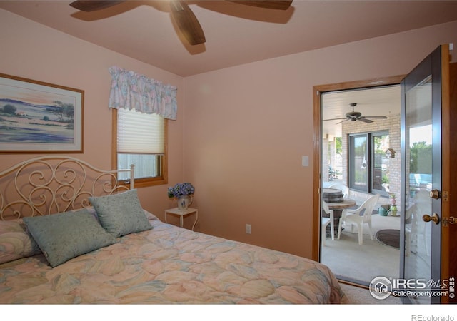 1314 State Highway 66, Longmont, CO 80504 - carpeted bedroom featuring access to outside, multiple windows, and ceiling fan