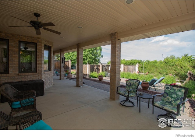 1314 State Highway 66, Longmont, CO 80504 - fenced backyard featuring a patio and a ceiling fan