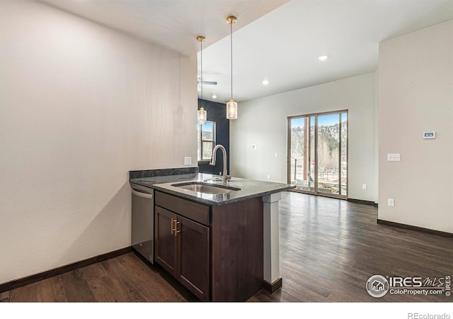 1768 Wildfire Rd Unit 101, Estes Park, CO 80517 - kitchen featuring a sink, dark wood-style flooring, dishwasher, a peninsula, and dark brown cabinetry