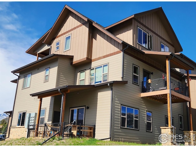 1768 Wildfire Rd Unit 101, Estes Park, CO 80517 - rear view of house featuring covered porch and a balcony