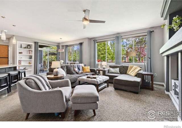 2620 Brush Creek Dr, Fort Collins, CO 80528 - living room featuring plenty of natural light and a ceiling fan
