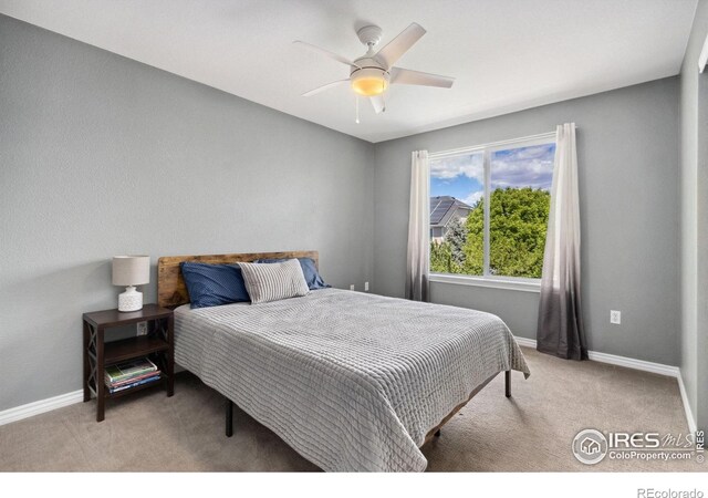 2620 Brush Creek Dr, Fort Collins, CO 80528 - carpeted bedroom with baseboards and ceiling fan