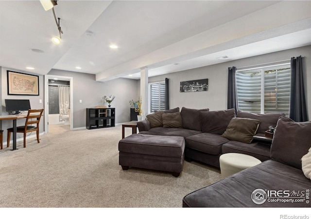 2620 Brush Creek Dr, Fort Collins, CO 80528 - carpeted living area with track lighting, recessed lighting, baseboards, and a desk