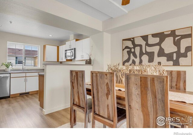 3860 Colorado Ave Unit C, Boulder, CO 80303 - dining room featuring light wood finished floors and recessed lighting