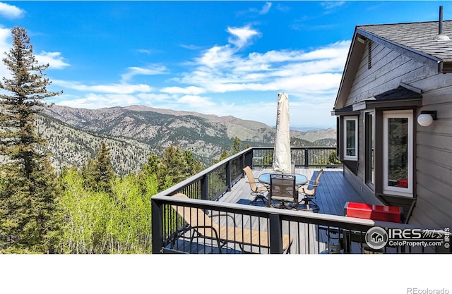 1100 Deer Trail Rd, Boulder, CO 80302 - wooden deck with outdoor dining area and a mountain view