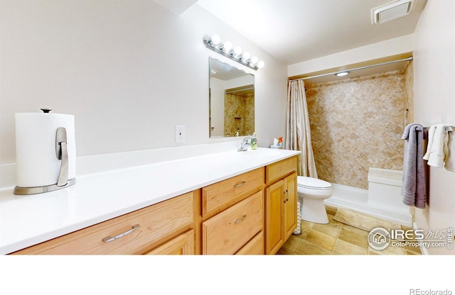 1100 Deer Trail Rd, Boulder, CO 80302 - full bath featuring vanity, toilet, and a shower with shower curtain