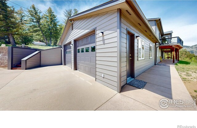 1100 Deer Trail Rd, Boulder, CO 80302 - view of property exterior with a garage