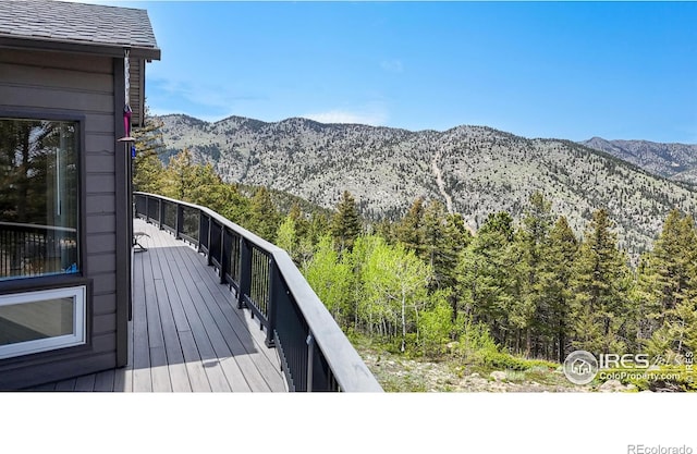 1100 Deer Trail Rd, Boulder, CO 80302 - view of mountain backdrop featuring a heavily wooded area