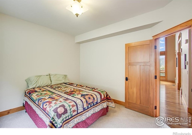 303 Curry Dr, Estes Park, CO 80517 - bedroom featuring baseboards and carpet flooring