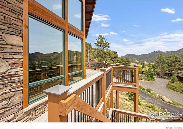 303 Curry Dr, Estes Park, CO 80517 - wooden terrace featuring a mountain view
