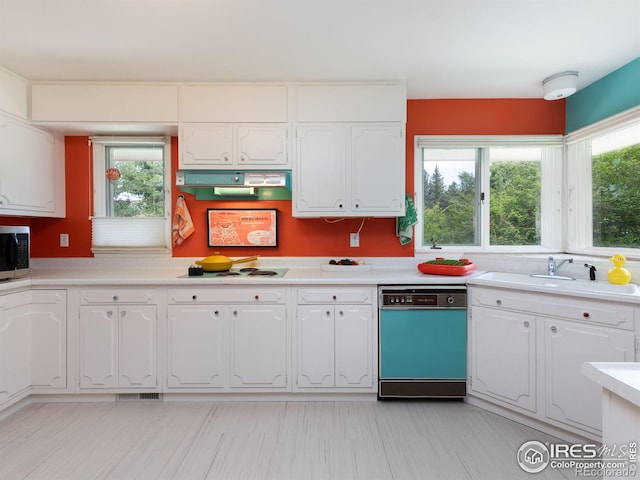 1035 Rosehill Dr, Boulder, CO 80302 - kitchen with dishwasher, under cabinet range hood, white electric stovetop, and white cabinetry