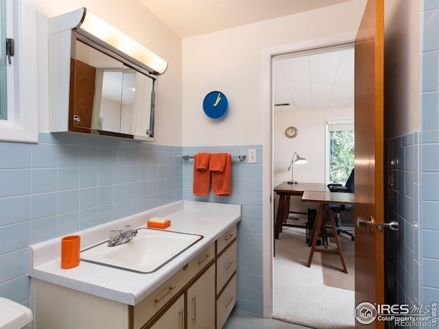 1035 Rosehill Dr, Boulder, CO 80302 - bathroom featuring vanity and tile walls