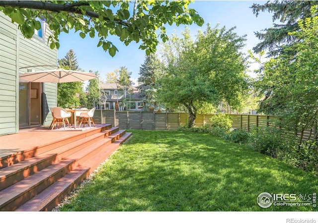 3470 16th Cir, Boulder, CO 80304 - view of yard with a wooden deck and outdoor dining area