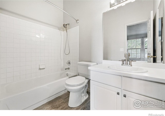3022 W 107th Pl Unit D, Westminster, CO 80031 - full bathroom featuring vanity, bathtub / shower combination, toilet, and wood finished floors
