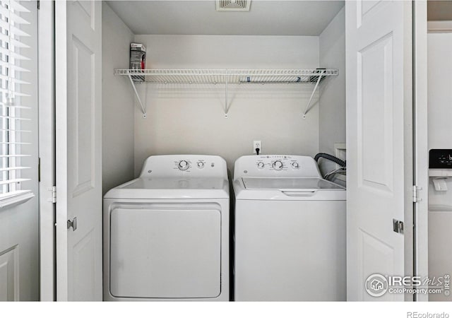 3022 W 107th Pl Unit D, Westminster, CO 80031 - laundry area with independent washer and dryer
