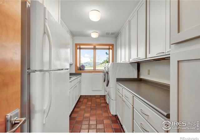 125 Saddleback Ln, Estes Park, CO 80517 - laundry area featuring cabinet space