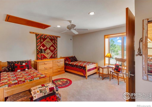 125 Saddleback Ln, Estes Park, CO 80517 - bedroom with light carpet, recessed lighting, and a ceiling fan