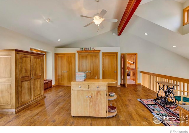 125 Saddleback Ln, Estes Park, CO 80517 - kitchen with light wood finished floors, a ceiling fan, a kitchen island, recessed lighting, and baseboards