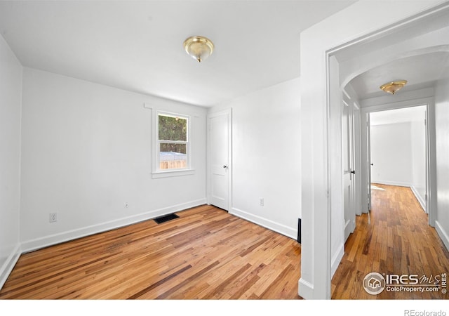 618 16th St, Greeley, CO 80631 - spare room featuring hardwood / wood-style floors and baseboards