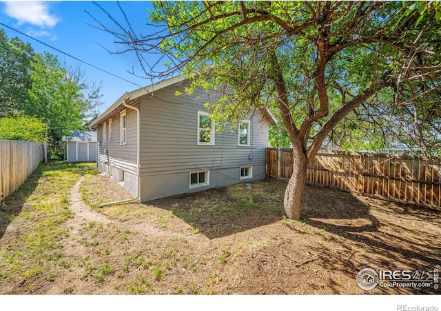 618 16th St, Greeley, CO 80631 - view of home's exterior with a fenced backyard