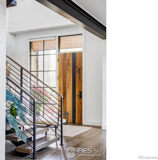 3737 Spring Valley Rd, Boulder, CO 80304 - stairs with wood finished floors and baseboards