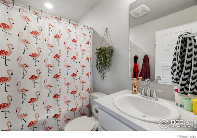 253 Molinar St, Johnstown, CO 80534 - full bath featuring vanity, toilet, a shower with curtain, and recessed lighting