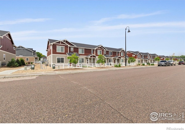 253 Molinar St, Johnstown, CO 80534 - townhome / multi-family property with a residential view