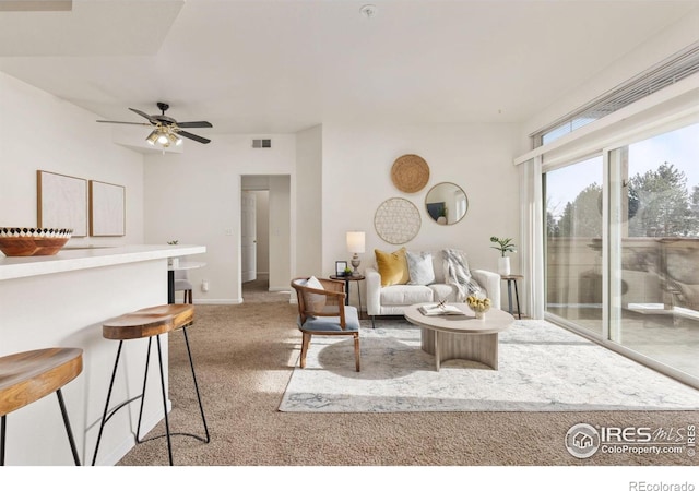 4545 Wheaton Dr Unit A-290, Fort Collins, CO 80525 - carpeted living room featuring a ceiling fan