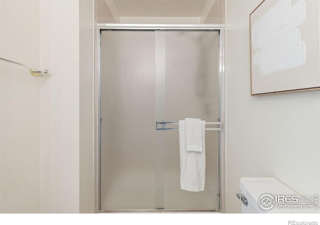 4545 Wheaton Dr Unit A-290, Fort Collins, CO 80525 - bathroom with a stall shower and toilet