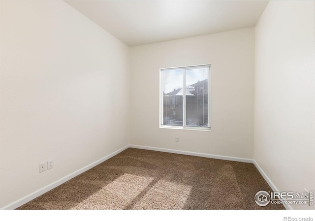 4545 Wheaton Dr Unit A-290, Fort Collins, CO 80525 - empty room with carpet and baseboards