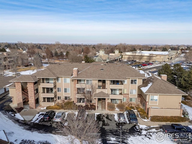 4545 Wheaton Dr Unit A-290, Fort Collins, CO 80525 - snowy aerial view with a residential view