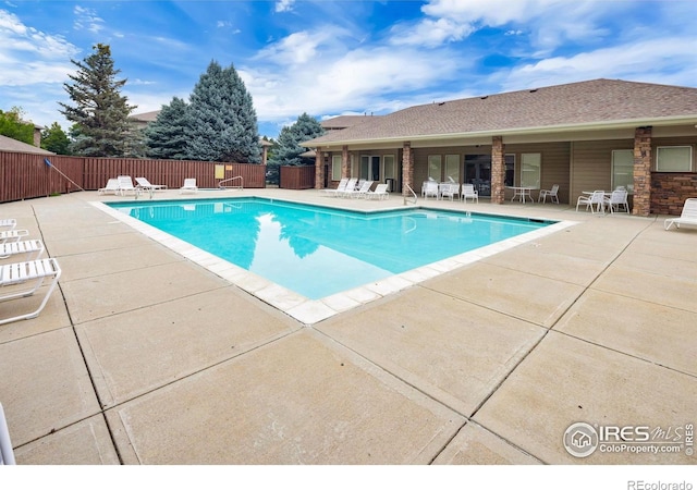 4545 Wheaton Dr Unit A-290, Fort Collins, CO 80525 - community pool featuring a patio