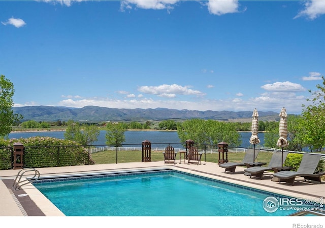 5025 Eagle Lake Dr, Fort Collins, CO 80524 - view of pool featuring a water and mountain view