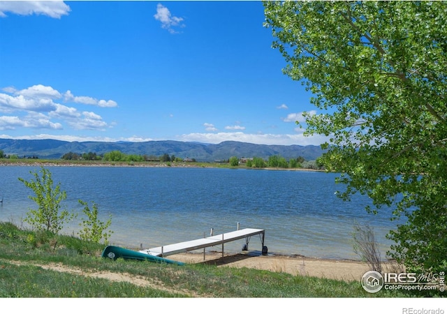 5025 Eagle Lake Dr, Fort Collins, CO 80524 - water view featuring a mountain backdrop and a boat dock